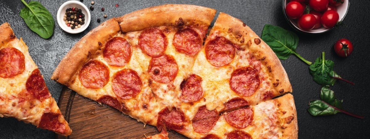 Energibesparende pakning af toppings til pizza