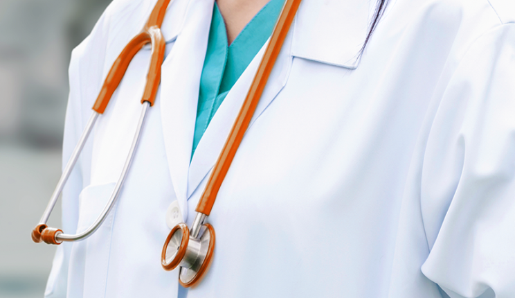 Doctor in white coat with stethoscope