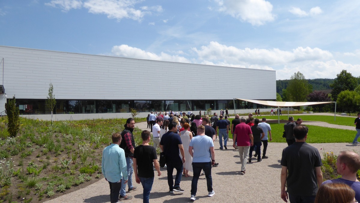 The employees explores the newly completed Central Park. Source: Busch Group