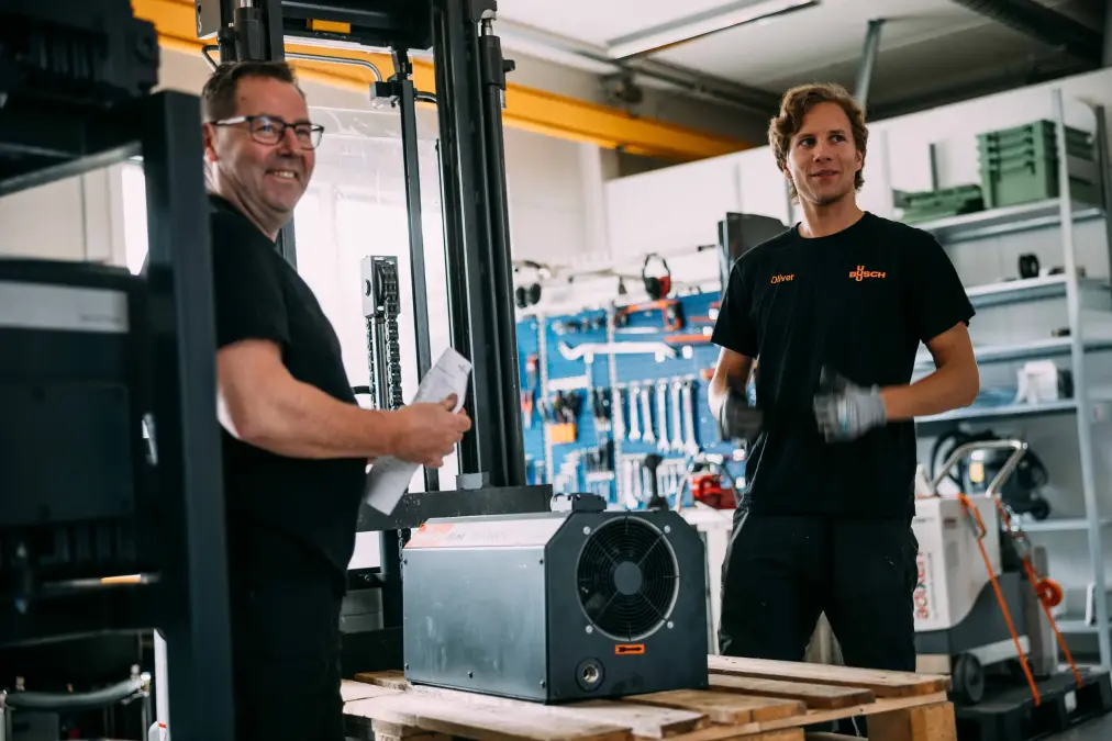 two_men_with_pump
